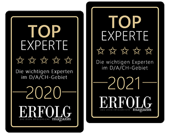 JBD: Zu sehen sind zwei Siegeln vom Erfolgs Magazin. JBD wurde im Jahr 2020 und 2021 als Top-Experte in Deutschland, Österreich und Schweiz ausgezeichnet.